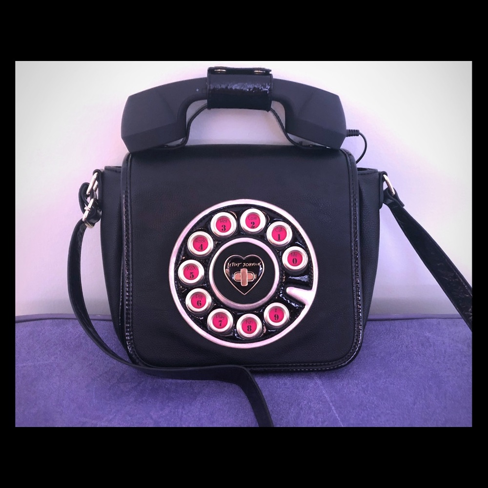 Betsey Johnson crossbody bag with phone.